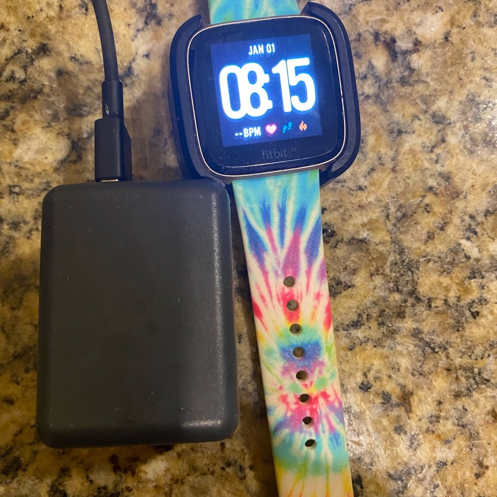 Fitbit Versa watch has 4 bands with it